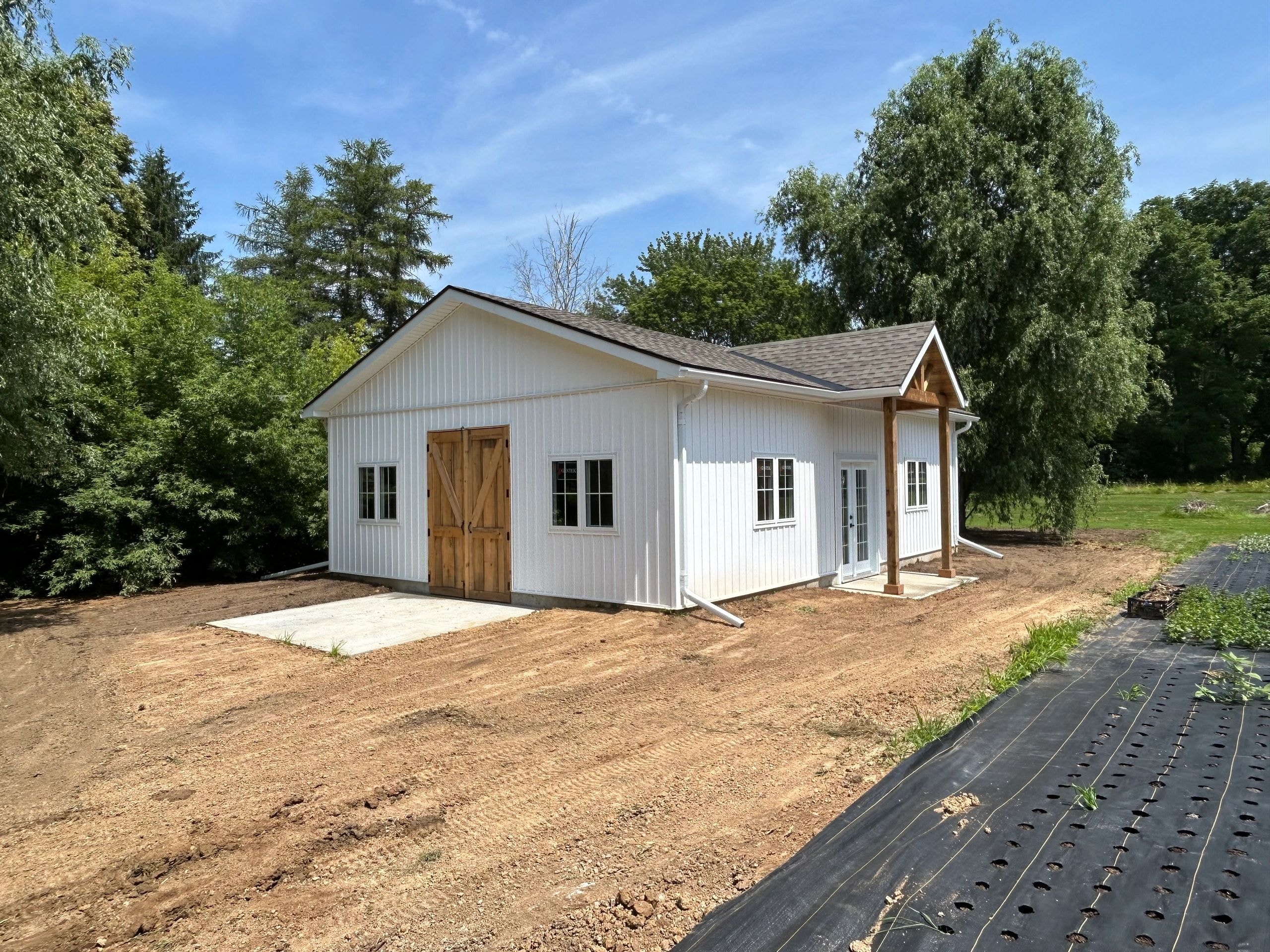 White outbuilding construction project